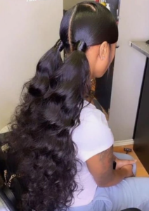 Two Low Ponytails With Weave